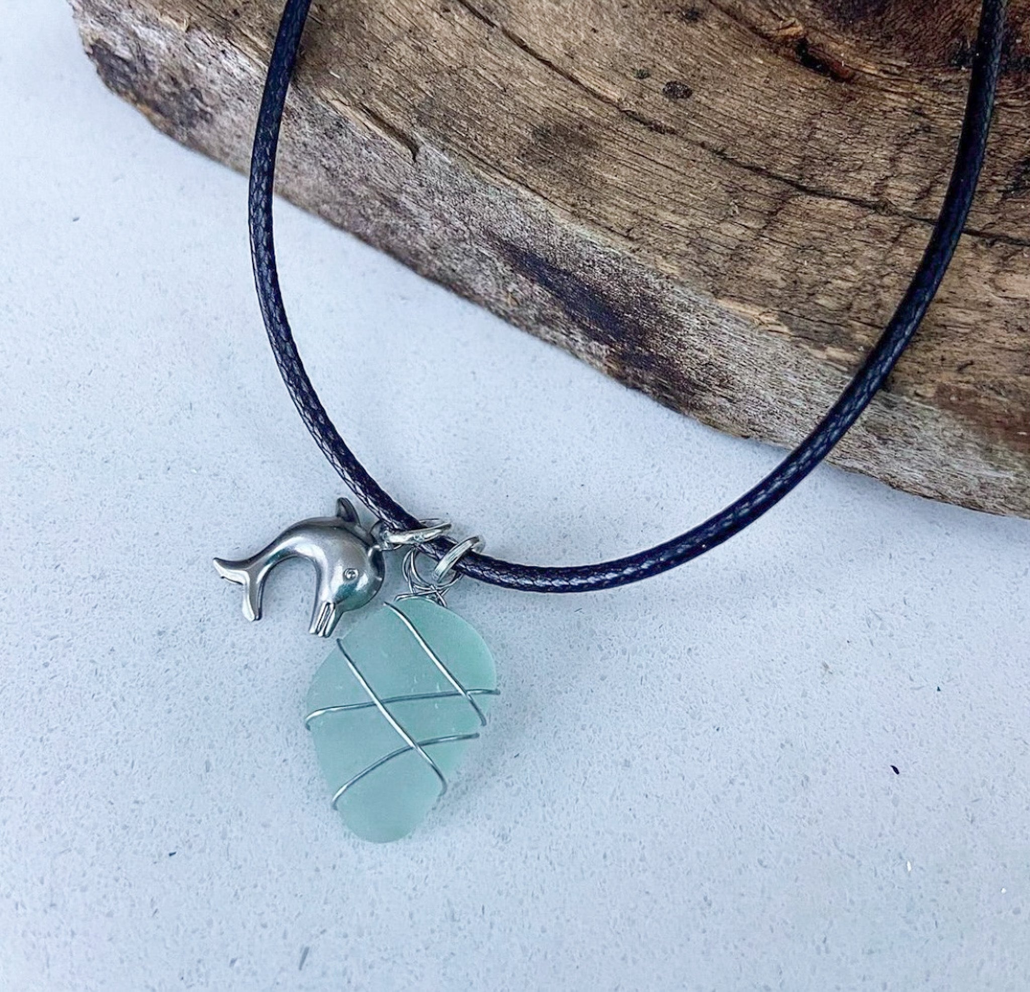 Handmade in Hawaii, leather cord unisex blue sea glass necklace